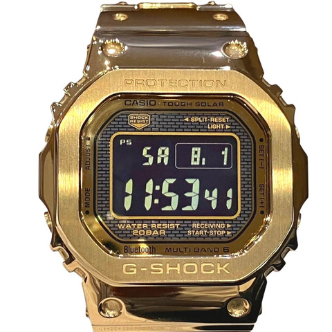 卡西歐 G-SHOCK 手錶，總重 153 克，不銹鋼材質，太陽能電波校時，液晶顯示屏，型號 GMW-B5000GD-9JF