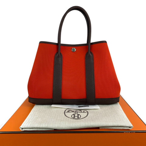 △ HERMES 愛馬仕 Orange Mecano Canvas Palladium Plated Metal Garden Party 30 Stamp B Handbag 機械橙色帆布鍍鈀金屬B刻手挽袋-267017875